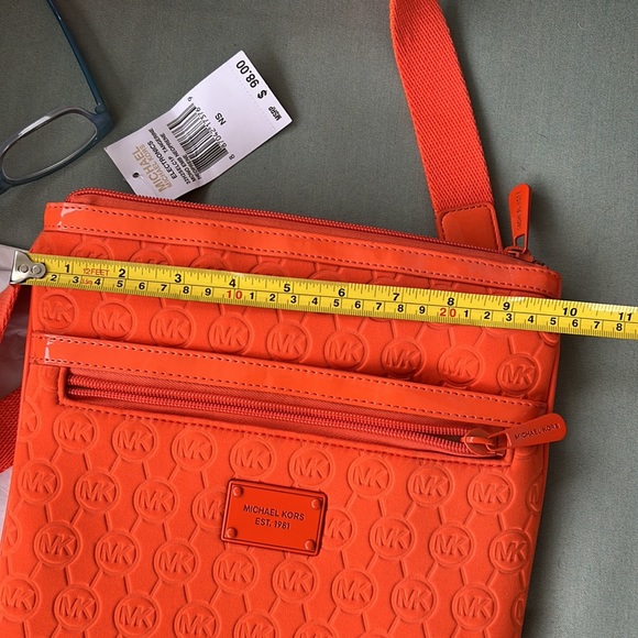 Cross Body embossed neoprene web cross body. Sleek cross body - Picture 7 of 9